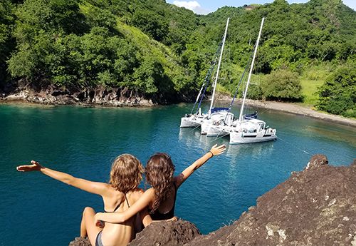 Two Broadreach scuba sail boats anchored in private cove on advanced scuba camp