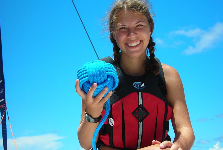 summer sailing camp student learning knots