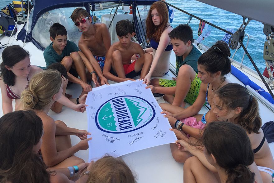 summer sailing camp teens with Broadreach flag