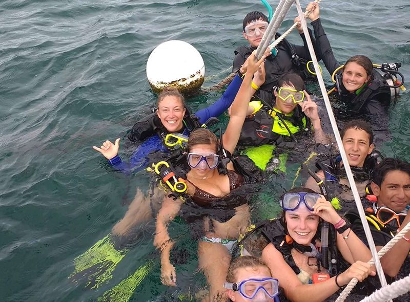 Teen divers on surface after Caribbean dive on Broadreach scuba