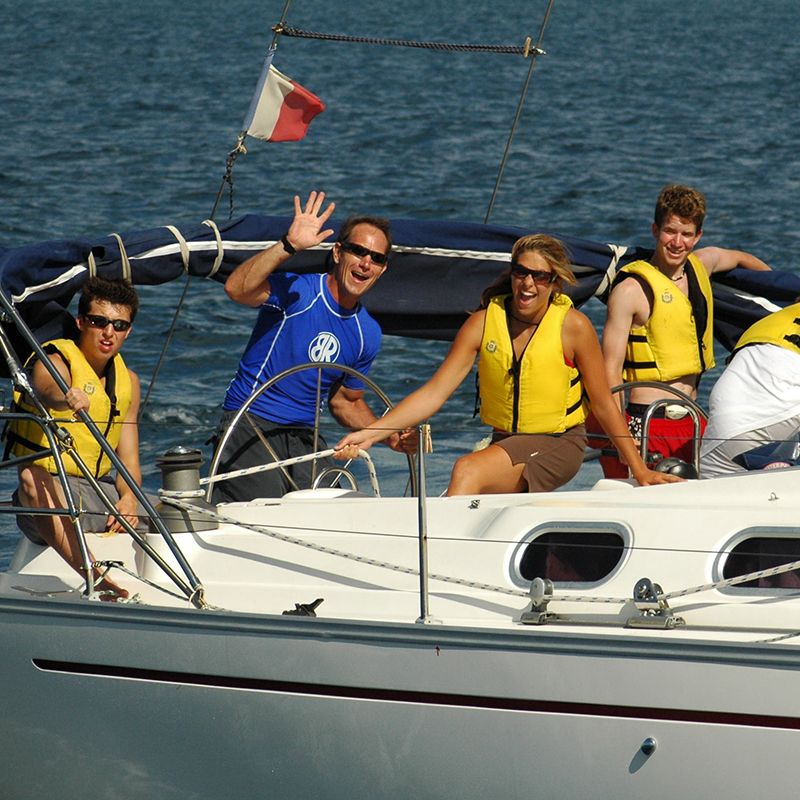 Founder of Broadreach Carlton Goldthwaithe on a boat in the Caribbean