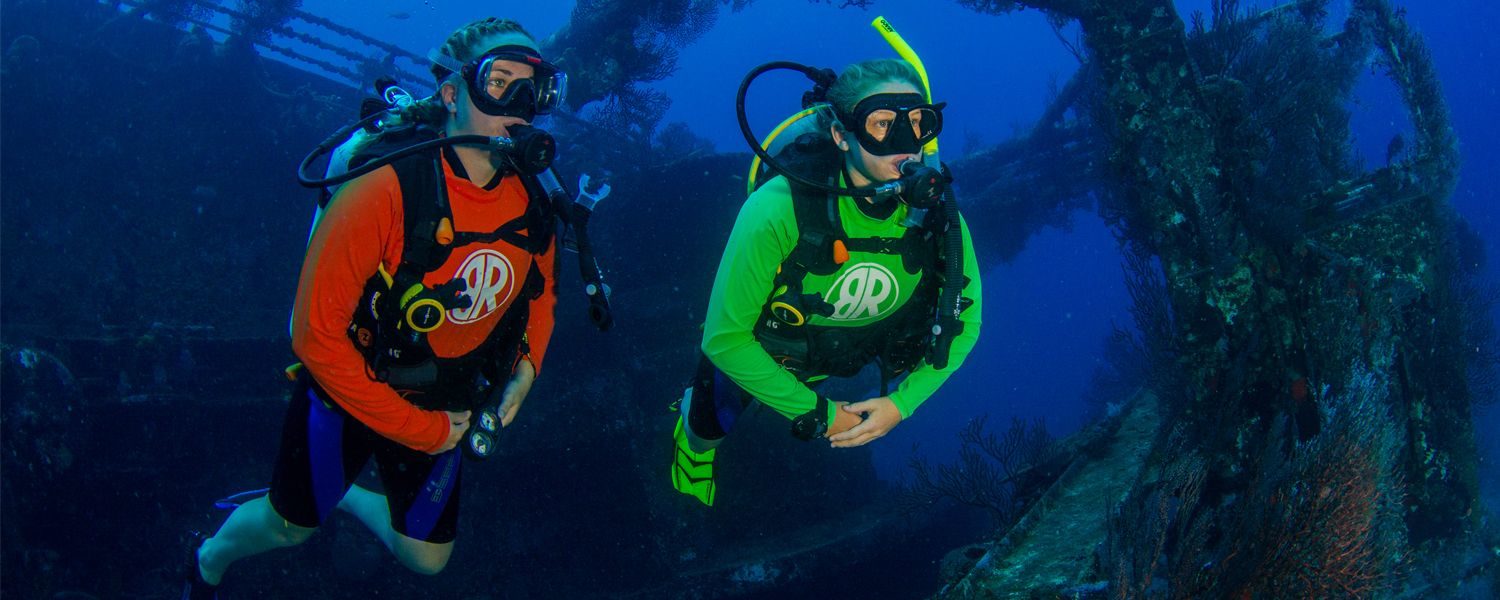 teens scuba diving