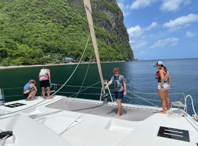 Middle school students on catamaran in Caribbean Windwards islands on advanced scuba and sailing trip