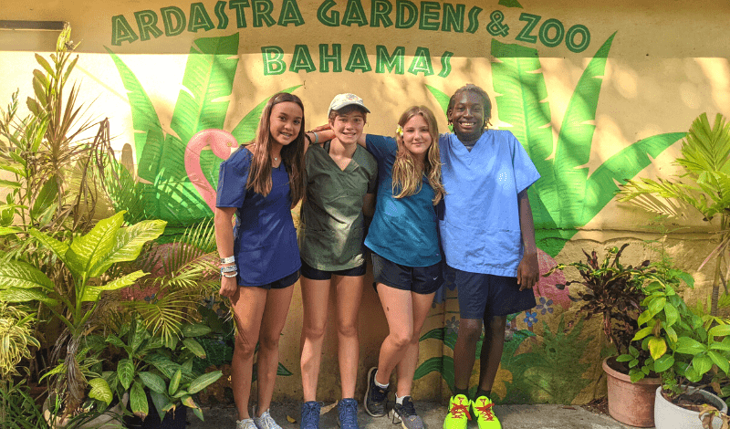 Middle school students at animal sanctuary in Bahamas for animal science camp