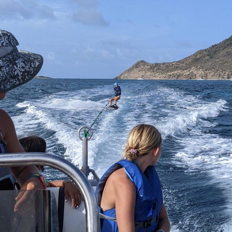 Middle school student doing watersports on summer sailing camp