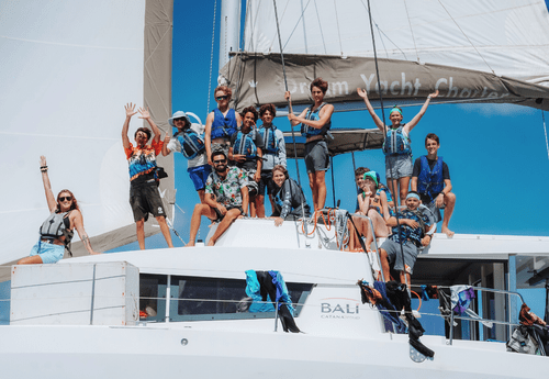 Group of teens on catamaran for Caribbean dive and sail program