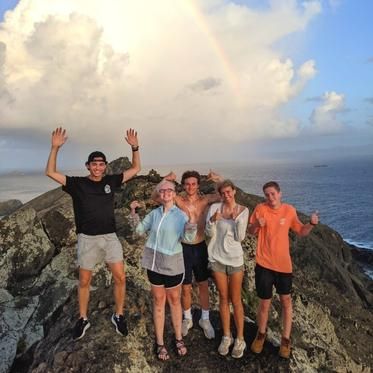 Teens hike on Caribbean island during sailing summer program