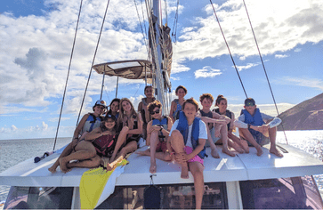 group of middle school students on boat at scuba camp