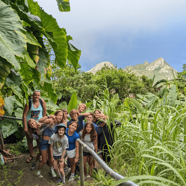 Middle school students hiking on summer Caribbean scuba and sailing program