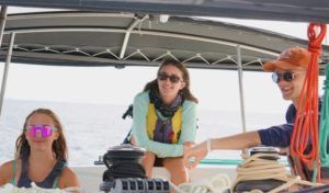 Teenagers at sailing summer camp in Caribbean