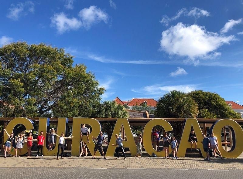 Group of high school students on international marine biology summer camp in Curacao