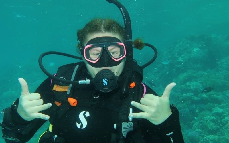 teen diving on marine biology summer camp