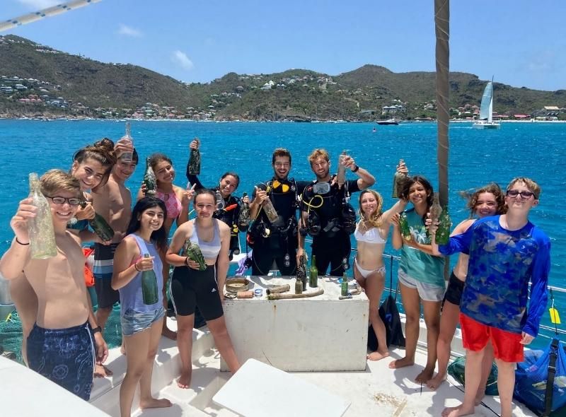Middle school students on a catamaran during Caribbean liveaboard summer program for middle school students