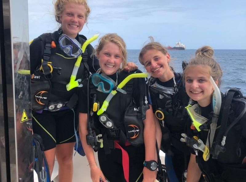 High school students in scuba gear on a teen scuba camp program