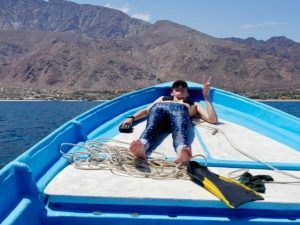 Marine biologist and Broadreach instructor on boat