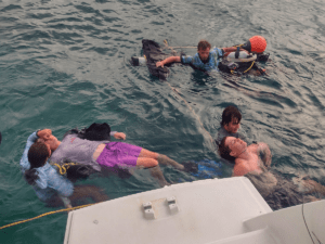 Teens practice rescue skills for PADI Rescue diver course on Broadreach Caribbean voyage