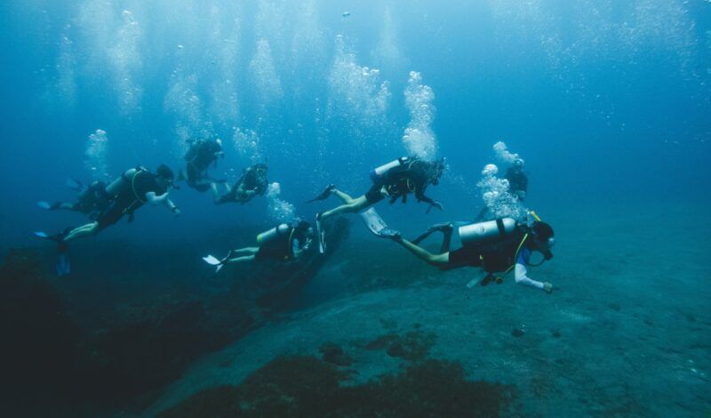 Middle school advanced scuba divers in Caribbean on dive program