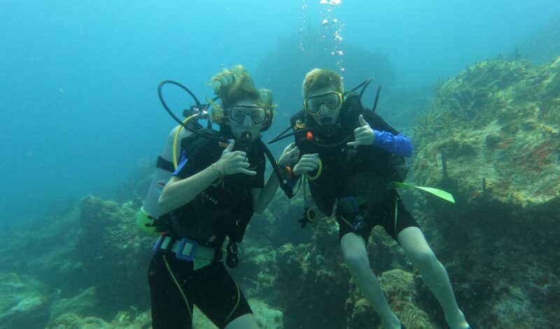 Middle school students scuba dive and learn about marine biology on summer program