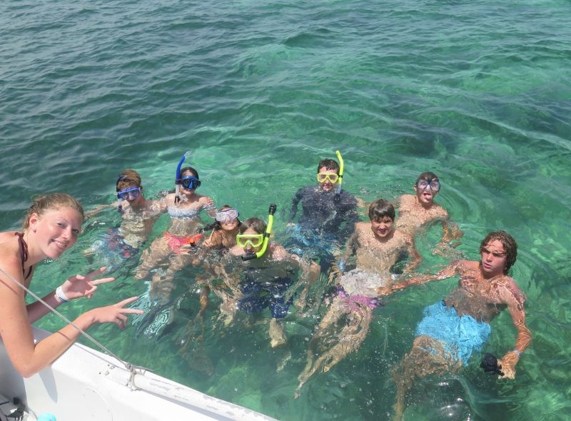 High school students snorkel in Cozumel on ocean conservation summer program
