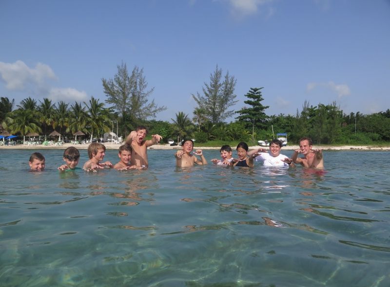 Teens at beach in Cozumel during ocean conservation summer program