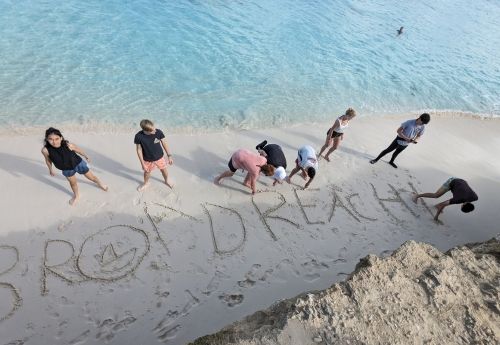 High school students on beach in Bonaire on advanced scuba diving trip