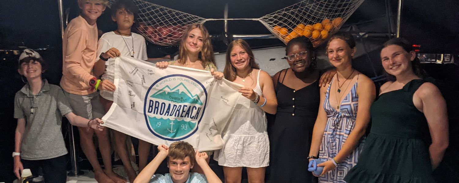 middle school students on catamaran in Caribbean on dive and sail summer program