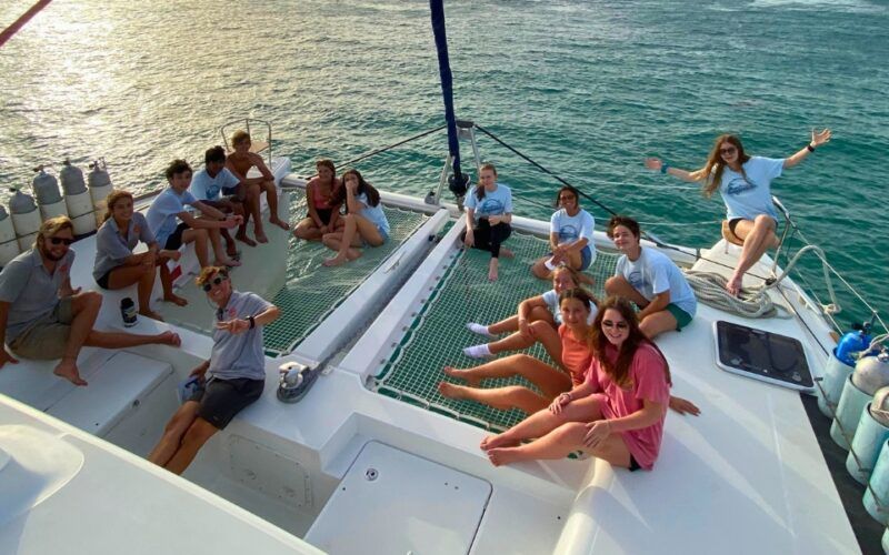 Students gather on catamaran during first day of Broadreach Caribbean trip