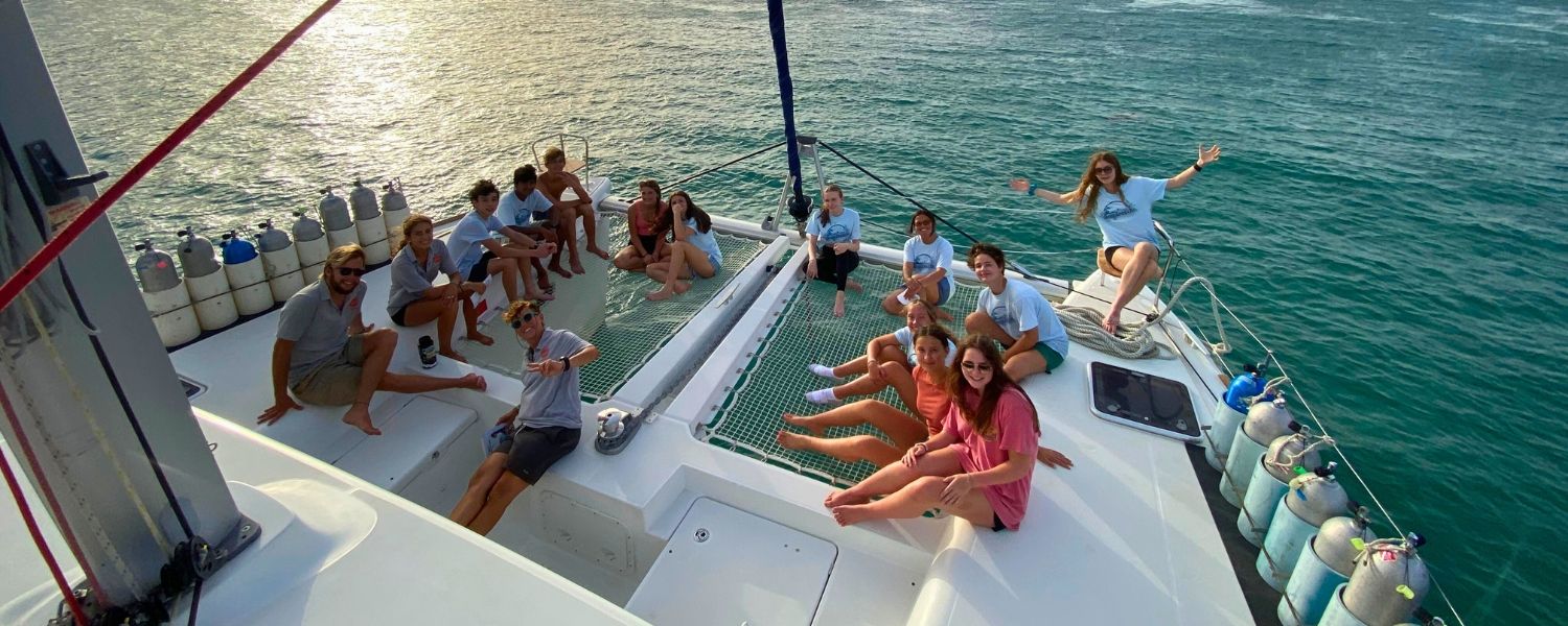 Students gather on catamaran during first day of Broadreach Caribbean trip