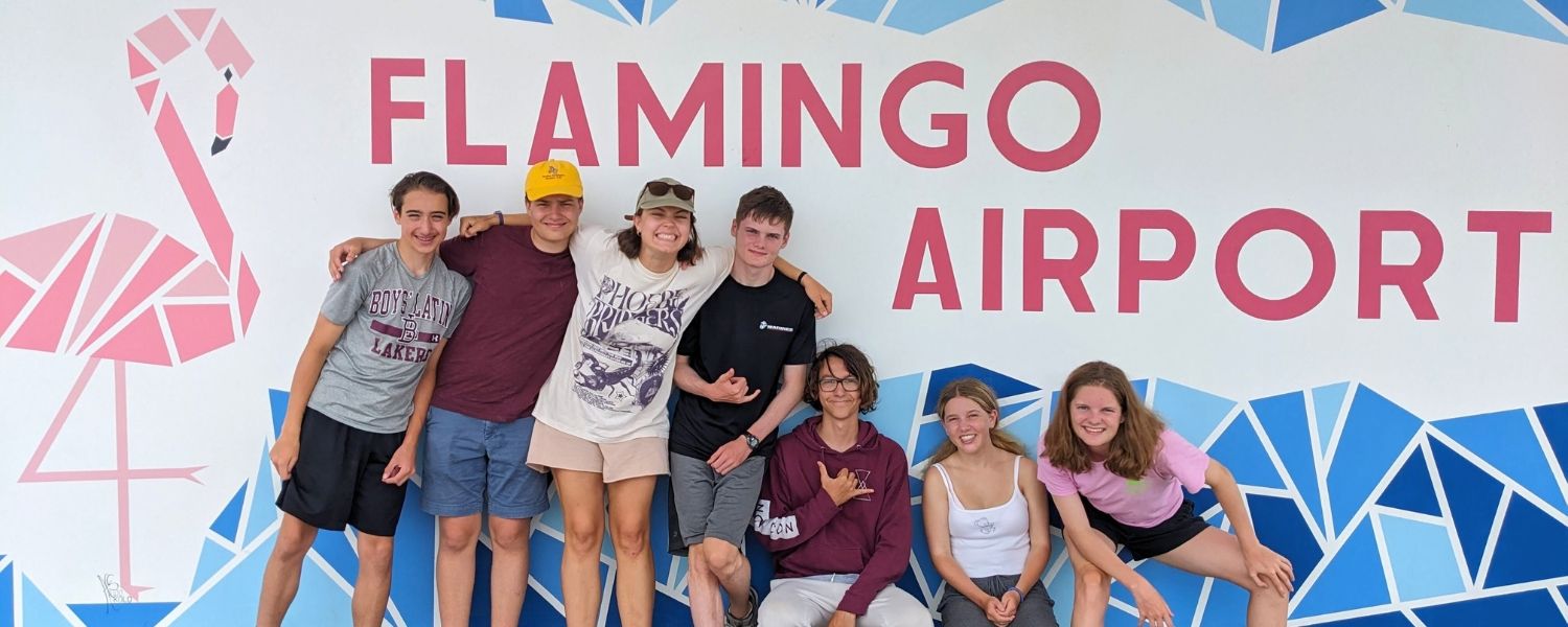 Broadreach students pose at airport in Bonaire on arrival day