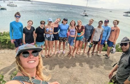 high school students hike in Caribbean island on weeklong dive and sail summer program