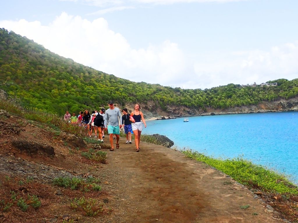 High school student walk along coast at Columbier St Barts